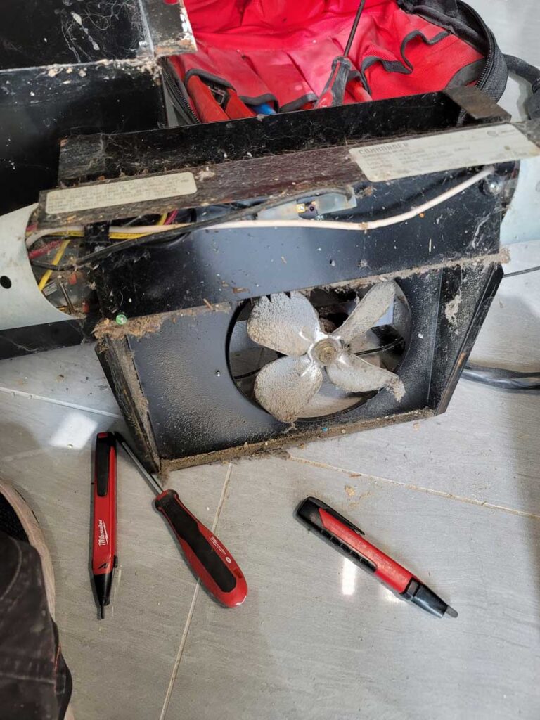 Handyman repairing a broken heating appliances