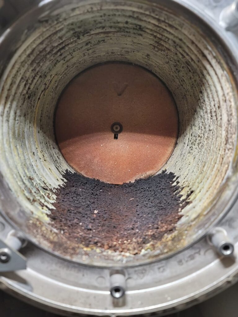 A close-up view of the interior rusted pipe