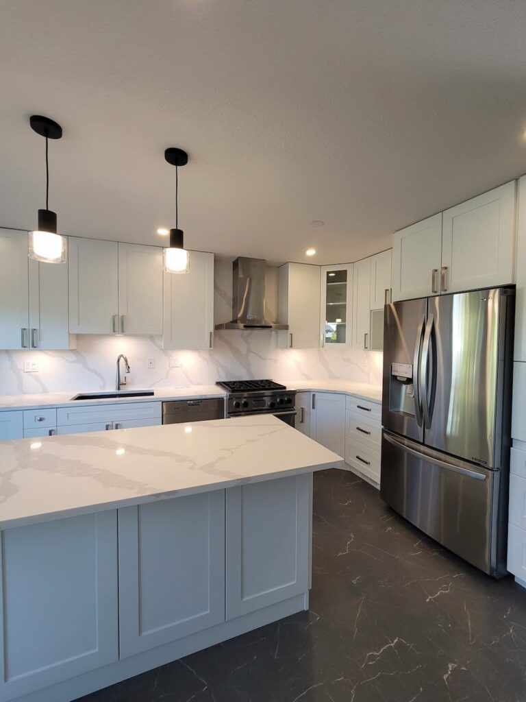 Remodeled kitchen with modern appliances and fixtures